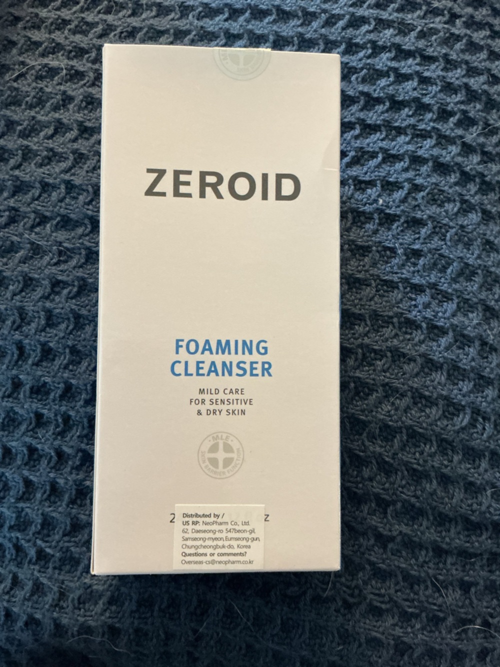 Zeroid Foaming Cleanser - White with Blue Text